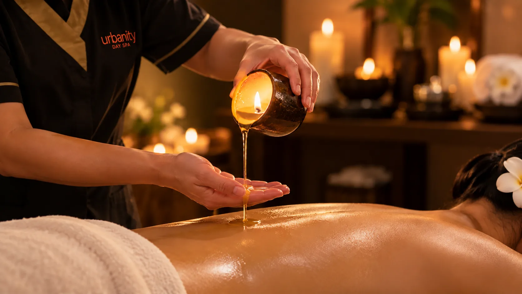 Warm candle body massage ritual at Urbanity Spa